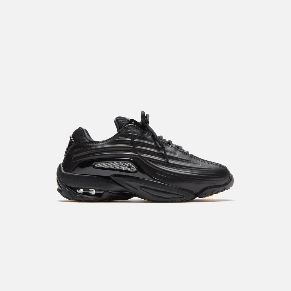 Nike x NOCTA Hot Step 2 - Black / Gunmetal / University Gold | Kith Black / Gunmetal / University Gold