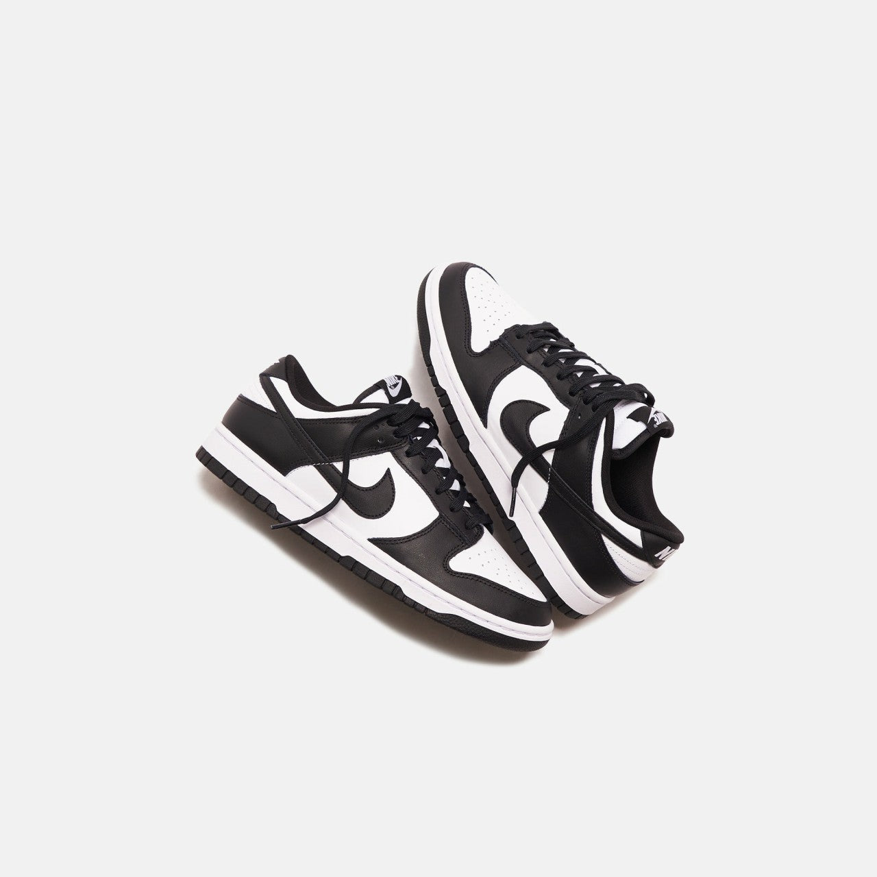 Nike Dunk Low Retro - White / Black | Kith White / Black