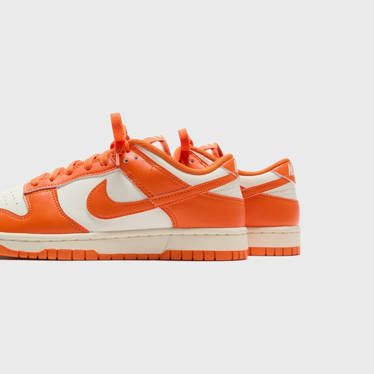 Nike Dunk Low Retro - Pale Ivory / Safety Orange | Kith Pale Ivory / Safety Orange