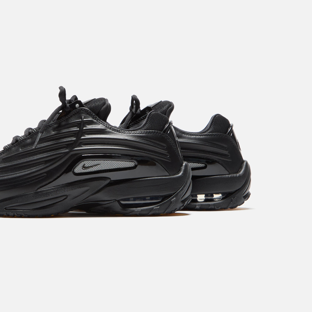 Nike x NOCTA Hot Step 2 - Black / Gunmetal / University Gold | Kith Black / Gunmetal / University Gold