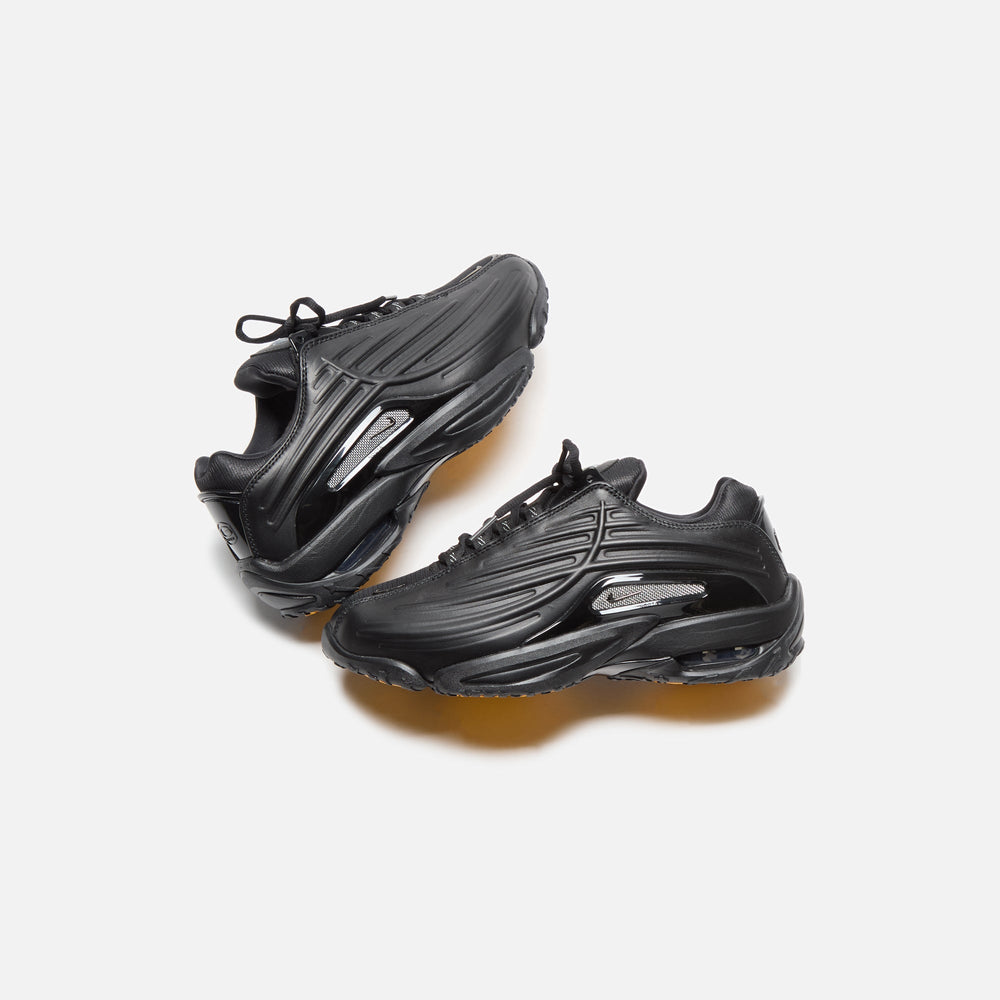 Nike x NOCTA Hot Step 2 - Black / Gunmetal / University Gold | Kith Black / Gunmetal / University Gold