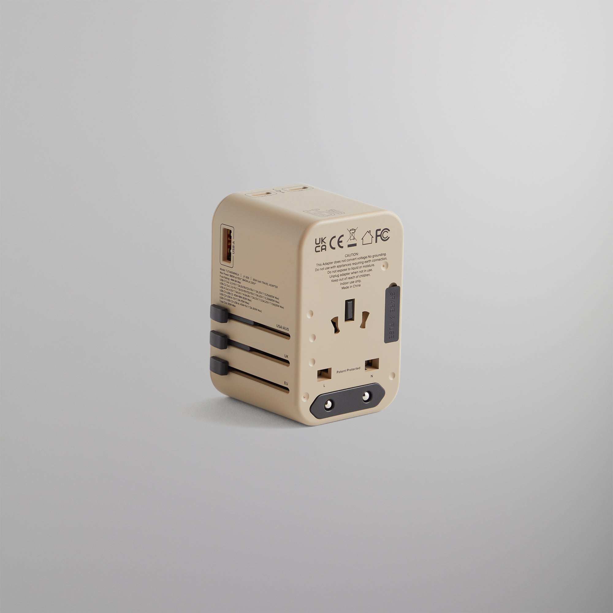 Kith for TUMI 65W Universal Power Adapter - Quicksand | Kith Quicksand