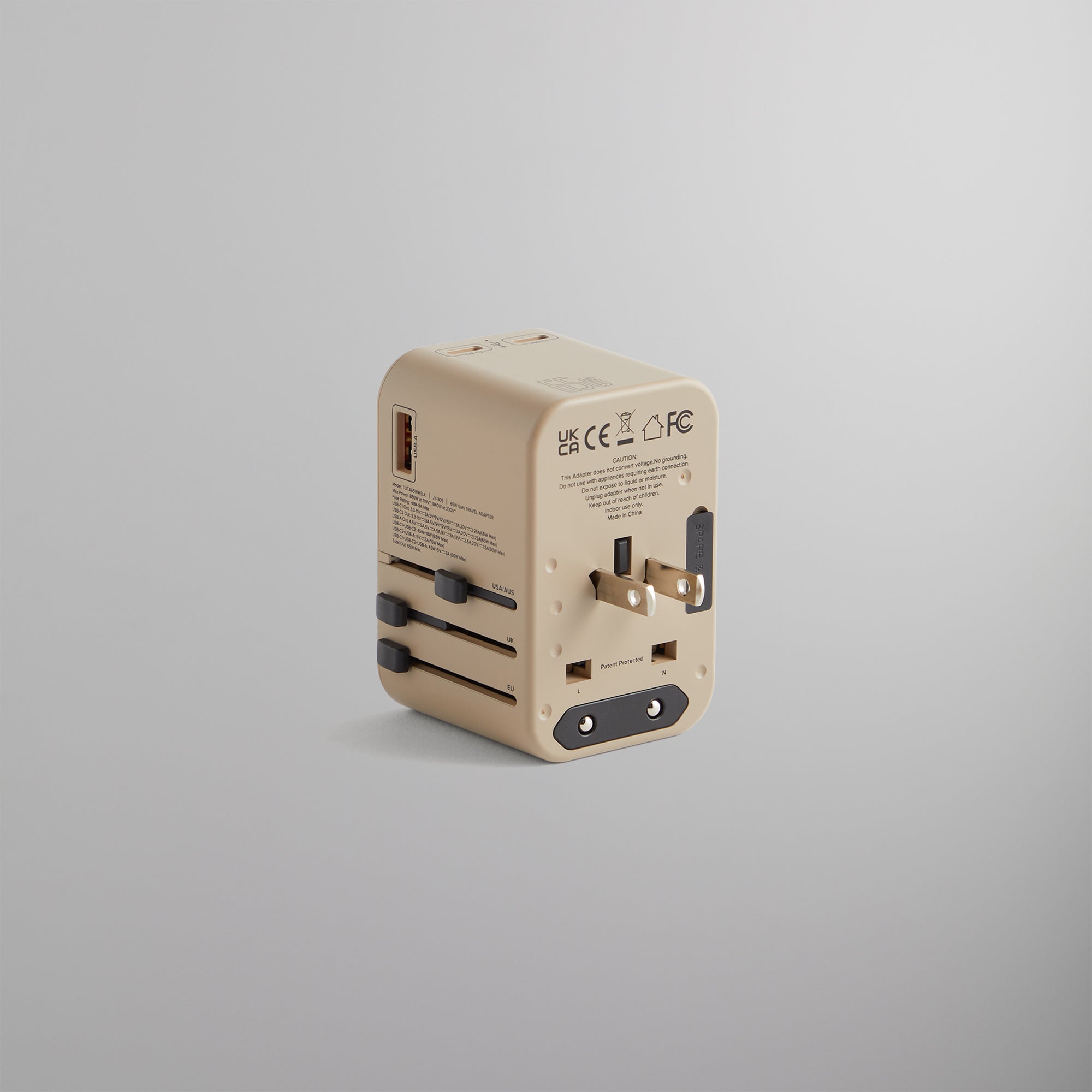 Kith for TUMI 65W Universal Power Adapter - Quicksand | Kith Quicksand