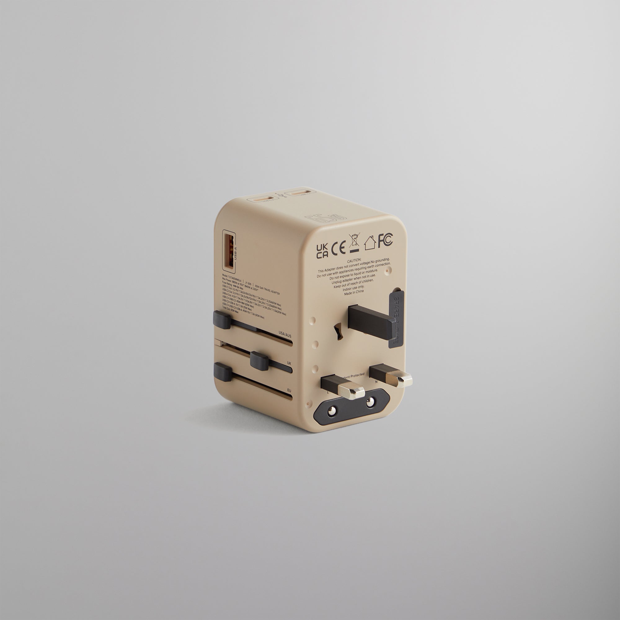 Kith for TUMI 65W Universal Power Adapter - Quicksand | Kith Quicksand