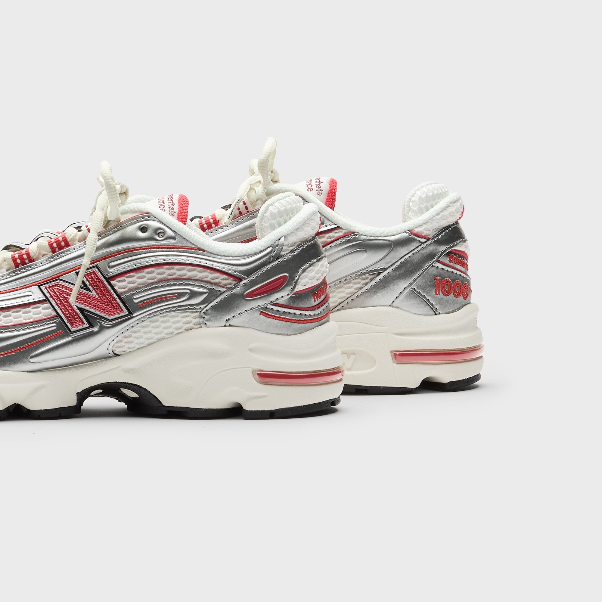 New Balance x This is Never That M1000 - Metallic Silver / Red | Kith Metallic Silver / Red