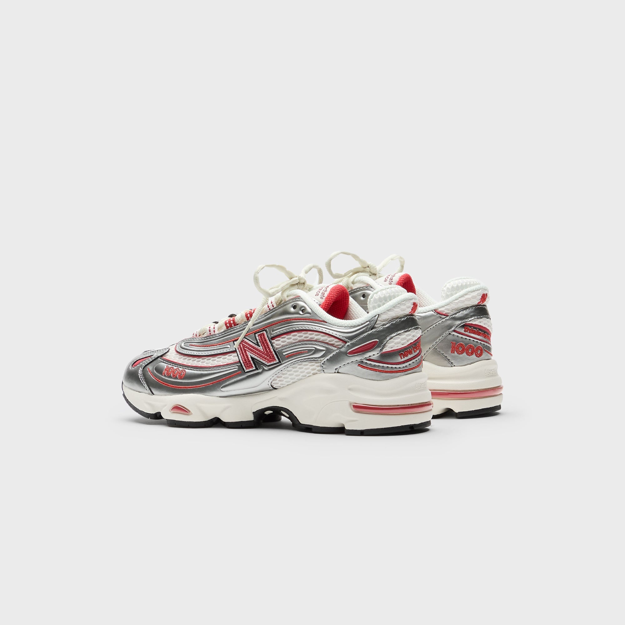 New Balance x This is Never That M1000 - Metallic Silver / Red | Kith Metallic Silver / Red