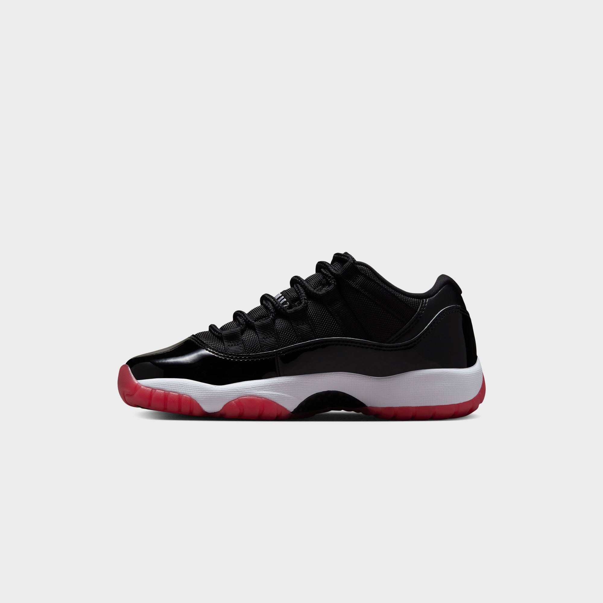 Jordan GS Air Jordan 11 Low - White / Varsity Red / Black | Kith White / Varsity Red / Black