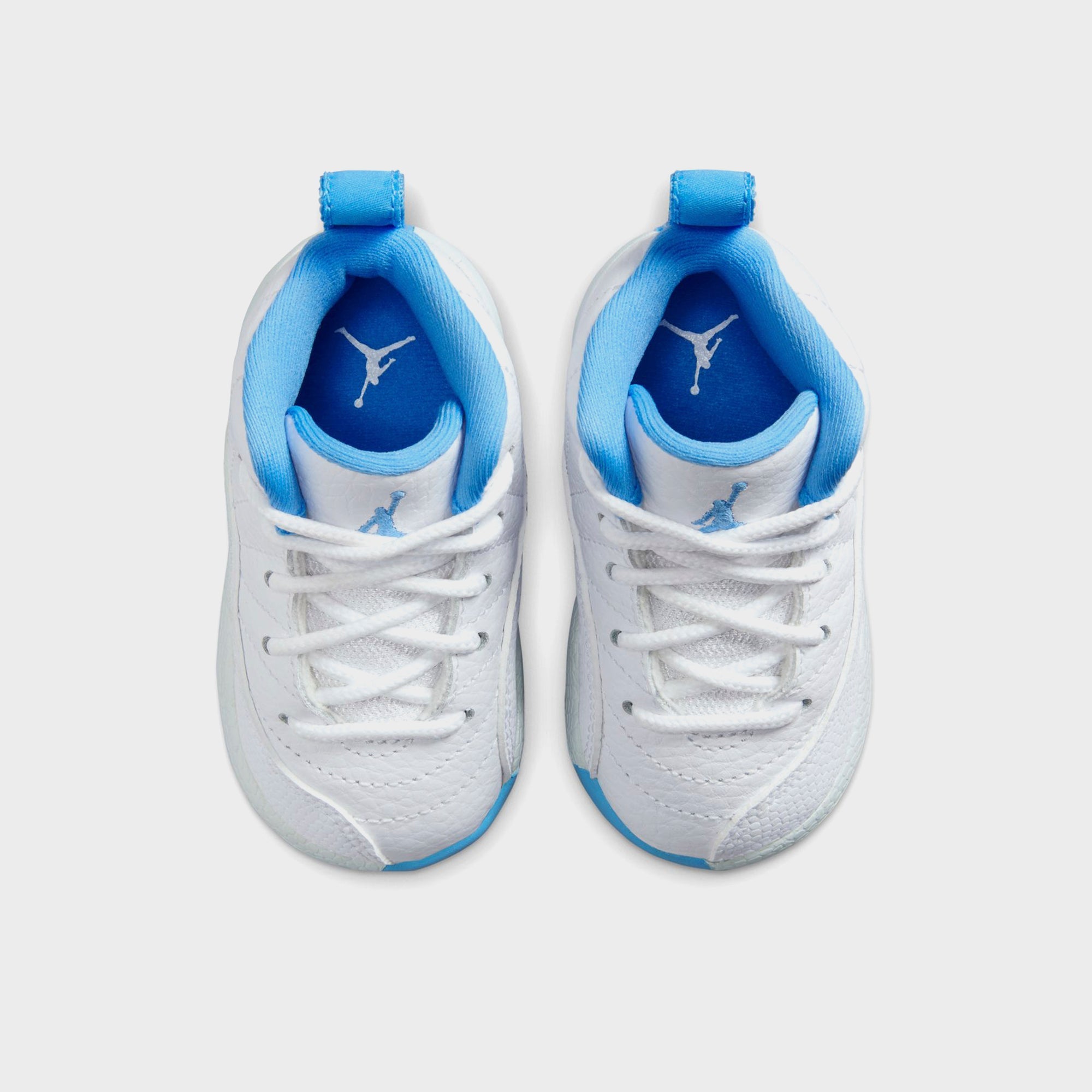 Jordan TD Jordan 12 Retro - White / Metallic Silver / University Blue | Kith White / Metallic Silver / University Blue